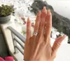 クラスターリングリアルソリッド100％925スターリングシルバー2CTダイヤモンド女性のための4つの薬指の結婚式の婚約