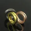 Высококачественный 316L Titanium Steel Pare Cring Classic Single Coil Spring Designer Designer Кольцо для женщин мужчины европейские модные ювелирные украшения