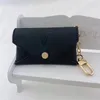 Unisex Womens Men Designer Keychain Fashion Fashion Purse Keyrings Marca Flores viejas Mini billeteras Conedas de crédito 8 colores sin caja