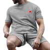 Tute da uomo firmate Estate Uomo Set Tuta Casual T-shirt tinta unita Maniche corte E Pantaloncini Set da 2 pezzi Moda uomo Fitness Pantaloni da allenamento Abiti da allenamento