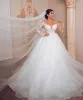 Magnifique Sheer Long Sleeve A Line Robes de mariée Full Lace Appliqued vestidos de novia Voir à travers les robes de soirée nuptiales robes de mariee