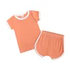 Set di abbigliamento a coste per bambini Estate Neonati maschi Ragazze in morbido cotone Completi per bambini Bambini Maglia a maniche corte Top + Pantaloncini elastici Articolo Pit Home Abiti casual M4106