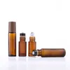 5ml 10ml 15ml Amber Glass Roll-on bottles Wood Grain Plastic cap Frosted Essential Oil Perfume Bottle with Stainless Steel Rollerball