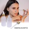 Olejki eteryczne z szklanymi szklanymi butelki perfum z drewnianą czapką odczynnik odczynnik kropla do oczu Aromaterapia płynne pojemniki 10 ml 30 ml 50 ml 100 ml