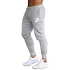 Automne hiver hommes pantalons Jogging course mâle Sport Fitness Sportswear respirant pantalons décontractés marque LOGO imprimer