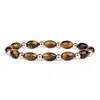 Moda Proteggi i braccialetti per la salute Donna Occhi di tigre naturale Perline di semi di pietra Gioielli Energia Ematite Healing Bracciale Reiki Uomo