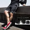 Summer Brand Mesh snabb torr fitness shorts män gym knä längd kroppsbyggande aktiv joggar träning svett korta byxor 220715