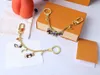 Högkvalitativ nyckelringmode Kvinnor Män Handgjorda bilnyckelringar Legering Stylish Buckle Designers Luxury Key Chain Påsar med Box Dust -väska