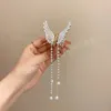 Pince à cheveux papillon avec pompon en perles pour femme, accessoires élégants pour cheveux, coiffure à Clip latéral papillon