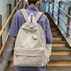 Mochilas de desenhos animados de designer de luxo Mochilas coreanas novas mochilas de grande capacidade Sacos quadrados de bolsas quadradas Bolsas de carteiras escolares