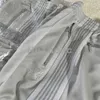 Drespants paski wysokiej jakości spodnie AWGE Wysokie marka igły haftowane igły igły motylki Mężczyźni ubrania ścieżki biały
