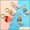 Key Rings sieraden mode parel ketting kristallen fles boog pompom sleutelhanger voor dames handtas ring auto pluizige puff ball sleutelhangers druppel levering