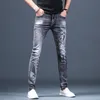 الأزياء 2021 الشارع الشهير سموكي رمادي كاوبوي الدينيم نحيل جينز الرجال السراويل قدم صغيرة العلامة التجارية الكورية عارضة المراهقين قلم رصاص بنطلون