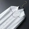 Vit skjorta Män Långärmad Slim Business Formal Dress Shirts Social Star Stage Party Tuxedo Blus Män Kläder