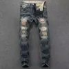 Atacado Jeans de grife de alta qualidade Destroyed Masculino Slim Denim Straight Biker Skinny Pants Casual Long Men Ripped Tech Fleece Jeans Tamanho 28-38