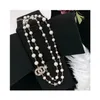 2022 Collana di moda Collane con ciondolo lunghe Fili di stile classico Stringhe Elegante catena di perle Lettera Gioielli maglione a doppio strato