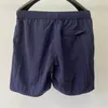 Verão pedra juventude ao ar livre casual esportes metal náilon shorts soltos calças de praia dos homens 5 pontos