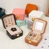 Jóias de viagem Organizador de couro PU com espelho Pequeno caixa de jóias portáteis para anéis Brincos Colares de pulseira de suporte de armazenamento