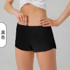 Sports de séchage rapide respirants shorts chauds chauds de sous-vêtements pour femmes de poche solide de running running fitness pantal