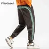 SIDE SHINGPANTS SWITTERANTS MEN 2022 BRAND NEW JOGGER PANTS MENTY FASHION ATTREWER ATTROMERS HIP HOP BROUSERS MALE