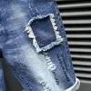 Jeans da uomo firmati Jeans skinny strappati a righe bianche Pantaloni da motociclista slim elasticizzati alla moda Pantaloncini neri