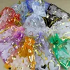 GRESTO DE GREST 100PCS Design de estrela Bonzing Bolsas de organza de alta qualidade Candel