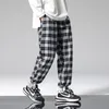 夏の格子縞のカジュアルパンツ男性の緩いヒップホップのズボン韓国の男性のハーレム特大ジョガーファッションストリートウェア220325
