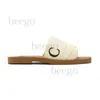 Mujeres para pantuflas Sandalias de goma de verano Chanclas de playa Desgastes Zapatos de interior Diseñador Lona Tejido cruzado Al aire libre Peep Toe Woody Casual Zapatilla Carta Estilos Zapatos