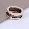 Ceramic Men Women High End Designer Rose Gold and Black Classic Titanium Steel Spring Rings Party Wedding Everyday Jewelry Accessories