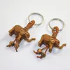 Porte-clés 1-2 pièces éléphant porte-clés pêche sculpture sur bois richesses chanceux Animal porte-clés pendentif femmes sacs Pom charme maison anneaux