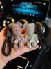 Luxury Creative Rhinestone Bear Keychain Fashion Punk Animal Keyring for Woman Car Bag Pendant Key Chains Couple Gift Wholesale AA220318