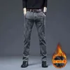 Pantaloni casual caldi stile invernale elastico allentato a tubo dritto grigio da uomo in peluche ispessito