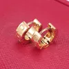 Brincho de fenda Mulheres de aço inoxidável Brincho de casal de ouro rosa Presentes de joalheria para acessórios para mulheres por atacado