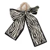 2022 Kvinnor Nytt tryck Pearl Head Rope Ribbon Silk Scarf Hairband Accessories Rubber Band Female Hair Tie Pärled Bodband