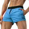 Män sport snabb torr utan foder shorts lätta elastiska bältesboxare stammar sylt för gym som kör fitness strand shorts 220526