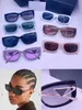 Gafas de sol de diseñador Para mujer Estilo de ojos de gato de verano Anti-ultravioleta Escudo retro Placa de lente Cuadrado pequeño Marco completo Moda Anteojos Caja aleatoria