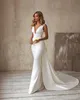 Tasarımcı Mermaid Backless Gelinlik Derin V Boyun Çizgisi Gelin Törenlerinde Büyük Yay Sweep Tren Saten Custom Made Vestido De Novia