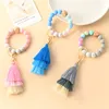 Flickor Smycken 2022 Nyaste Silikon Beaded Armband Armband Armband Bottu Tråd Tassel Keychain Armband Hållare Kvinnor Damer