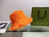 럭셔리 디자이너 버킷 모자 여름 남녀 남자 넓은 챙 모자 밀짚 삼각형 퍼지 모자 태양 여성을위한 예방 2022313t