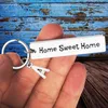 سلاسل المفاتيح المنزل الحلو Keychain Housewarming يعرض مالك المنزل إغلاق هدايا أفكار العقارات من وكيل العميل