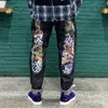 Jeans firmati Jeans da uomo a gamba dritta colore retrò Jeans skinny strappati effetto consumato Pantaloni hip-hop Pantaloni lavati Modello lungo regolare