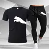Tuta sportiva da uomo Estate Nuovo stile di marca Stampa Tuta Casual Cotone Maniche corte Moda T-shirt + Pantaloni Set Abiti maschili Y220420