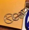 Anahtar halka anahtar zincirleri stereo astronot viutonity alan harfleri yuvarlak kart moda metal anahtar zinciri kolye aksesuarları orijinal ambalaj lvs