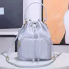 حقيبة دلو مصممة مصممة rennylon handbag mini tote small luxurys crossbody bags with silk dickf ladies nano poundes saffiano duet