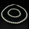 Odlat Shell White Pearl 8x8 MM Pärlor Stretch Necklace Armband Set