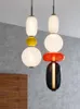 قلادة مصابيح الشمال الإبداعية ملونة LED Glass Glass Chandelier حديث Art Art Cafe Roomtroom مصباح مطعم بجانب السرير الثريا