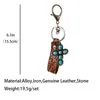 Keychains Vintage Echt lederen emboss Bloempolspolspompels Pompoen Blossoms Turquoise Cross Keychain Hoge kwaliteit Key Chain WholesalKeychai