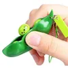 Fidget Soybean 장난감 땅콩 완두콩 Squeeze-a-Bean 키 체인 손가락 퍼즐 초점 압출 완두콩 펜던트 스트레스 릴리프 자폐증이있는 어린이는 감압 장난감 선물이 필요합니다.