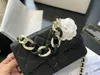 Väskor Black Camellia Shoulder Bag 5a High-End Quality Designer Luxury Fashion Casual Women's Chain Bag Dust Underarm Banket Coin Purse