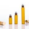 Bouteille d'huile essentielle de bouteille en verre de parfum de rouleau ambre rechargeable de 3ml 5ml 10ml avec le métal en acier